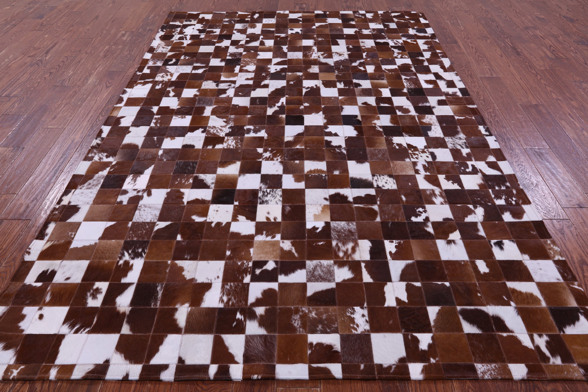 Brown & White Natural Cowhide Hand Stitched Patchwork Rug - 6' 7" X 9' 10"