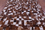 Brown & White Natural Cowhide Hand Stitched Patchwork Rug - 6' 7" X 9' 10"