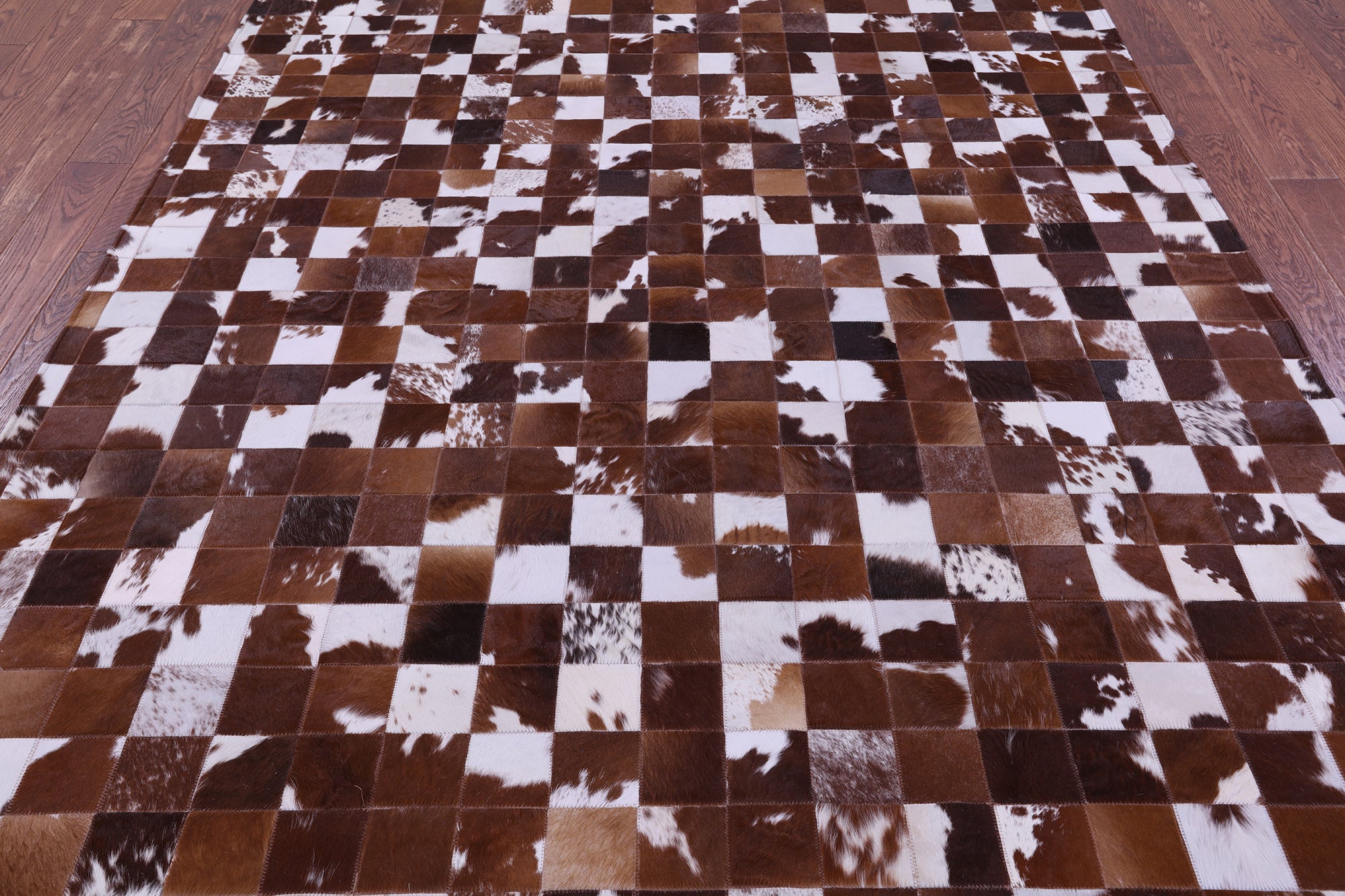 Brown & White Natural Cowhide Hand Stitched Patchwork Rug - 6' 7" X 9' 10"