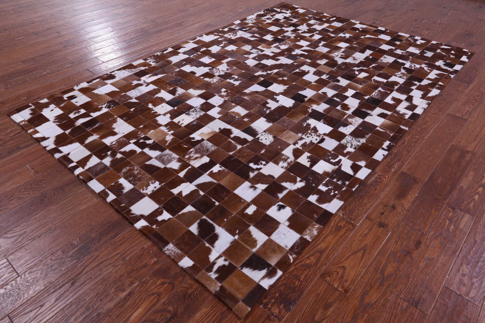 Brown & White Natural Cowhide Hand Stitched Patchwork Rug - 6' 7" X 9' 10"