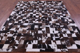 Brown & White Natural Cowhide Hand Stitched Patchwork Rug - 6' 7" X 8' 3"