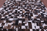 Brown & White Natural Cowhide Hand Stitched Patchwork Rug - 6' 7" X 8' 3"