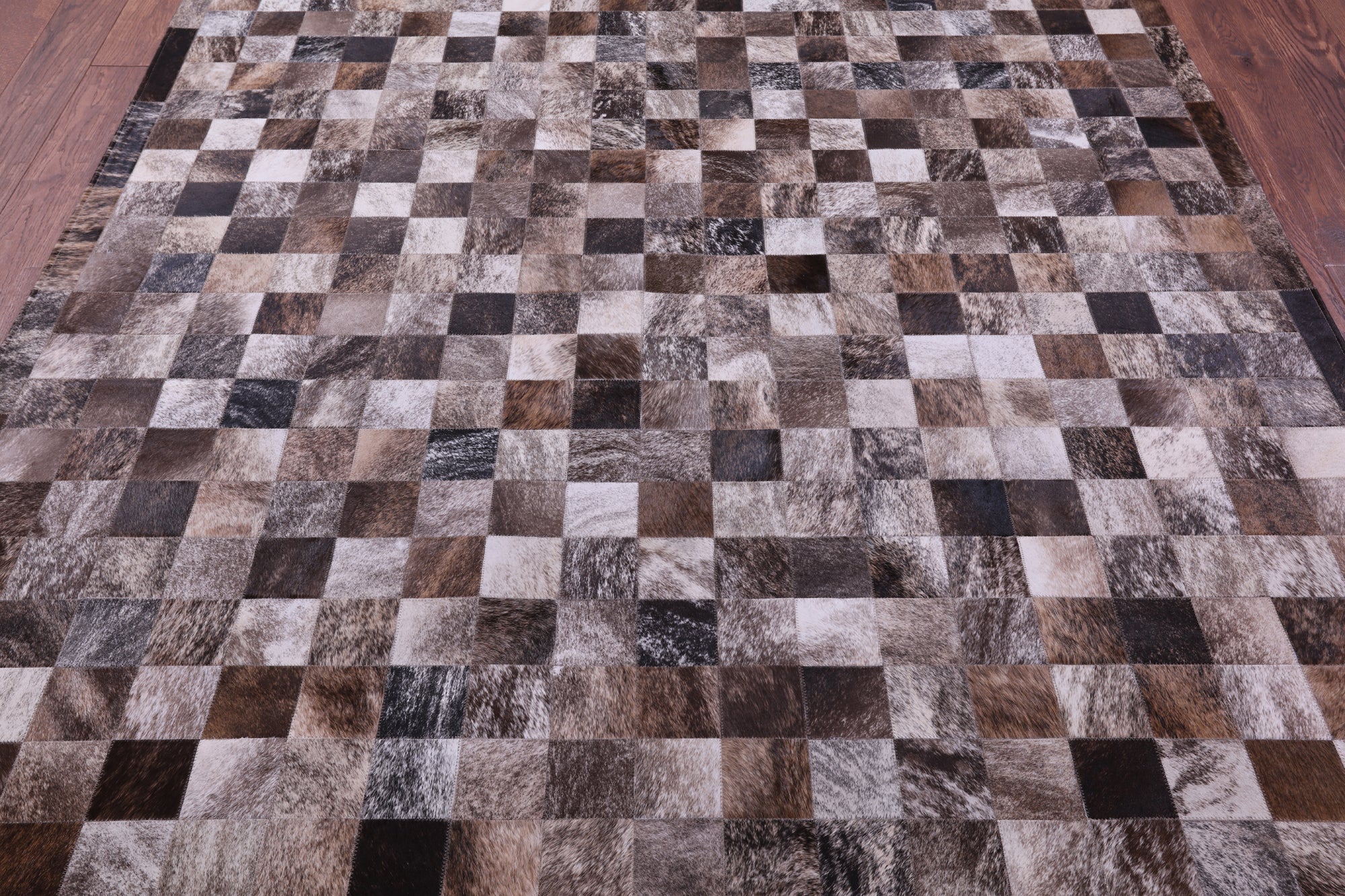 Brown & White Brindle Natural Cowhide Hand Stitched Patchwork Rug - 6' 7" X 8' 3"