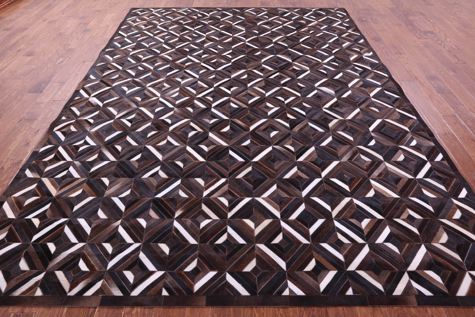 Brown Natural Cowhide Hand Stitched Patchwork Rug - 9' 0" X 12' 0"
