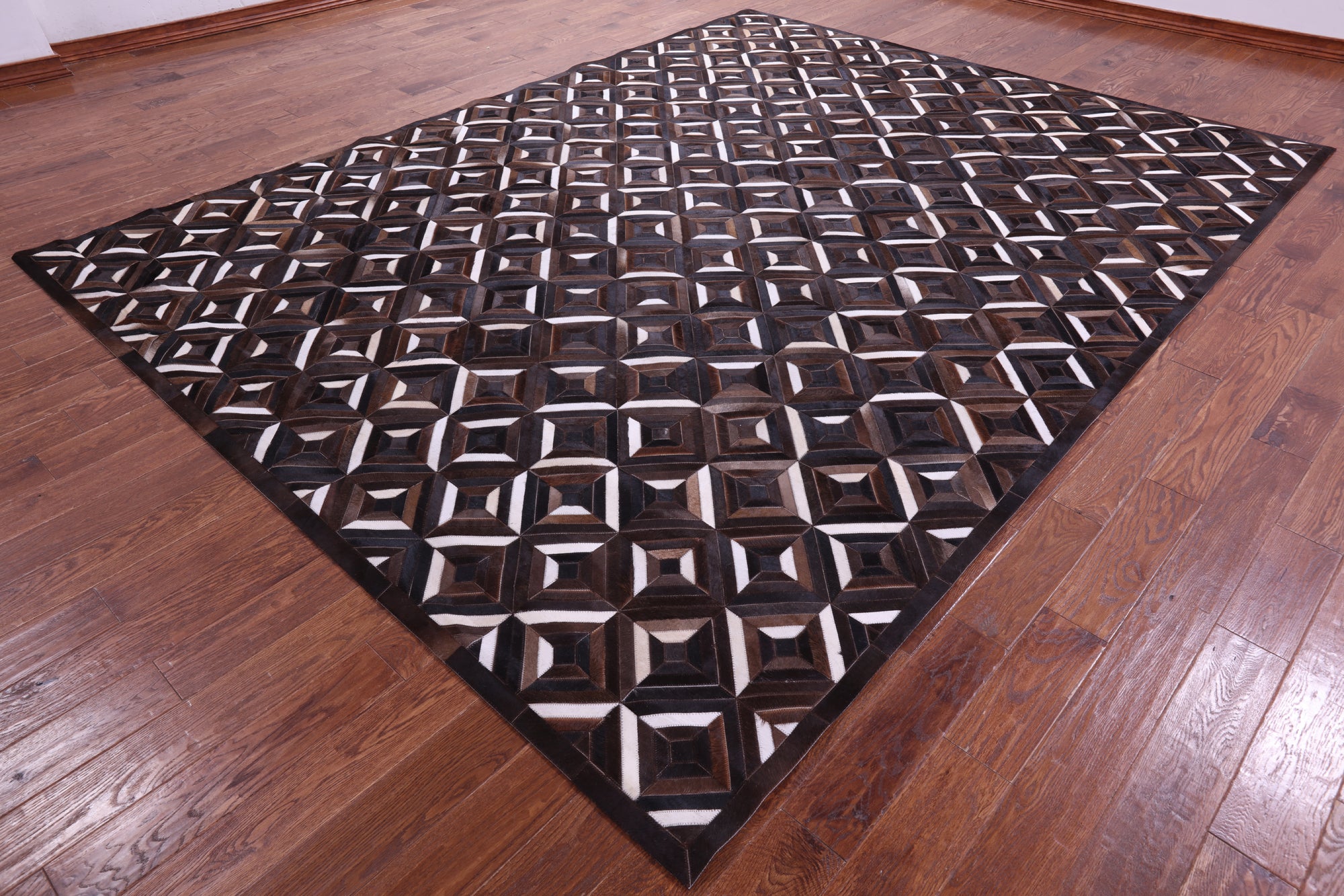 Brown Natural Cowhide Hand Stitched Patchwork Rug - 9' 0" X 12' 0"
