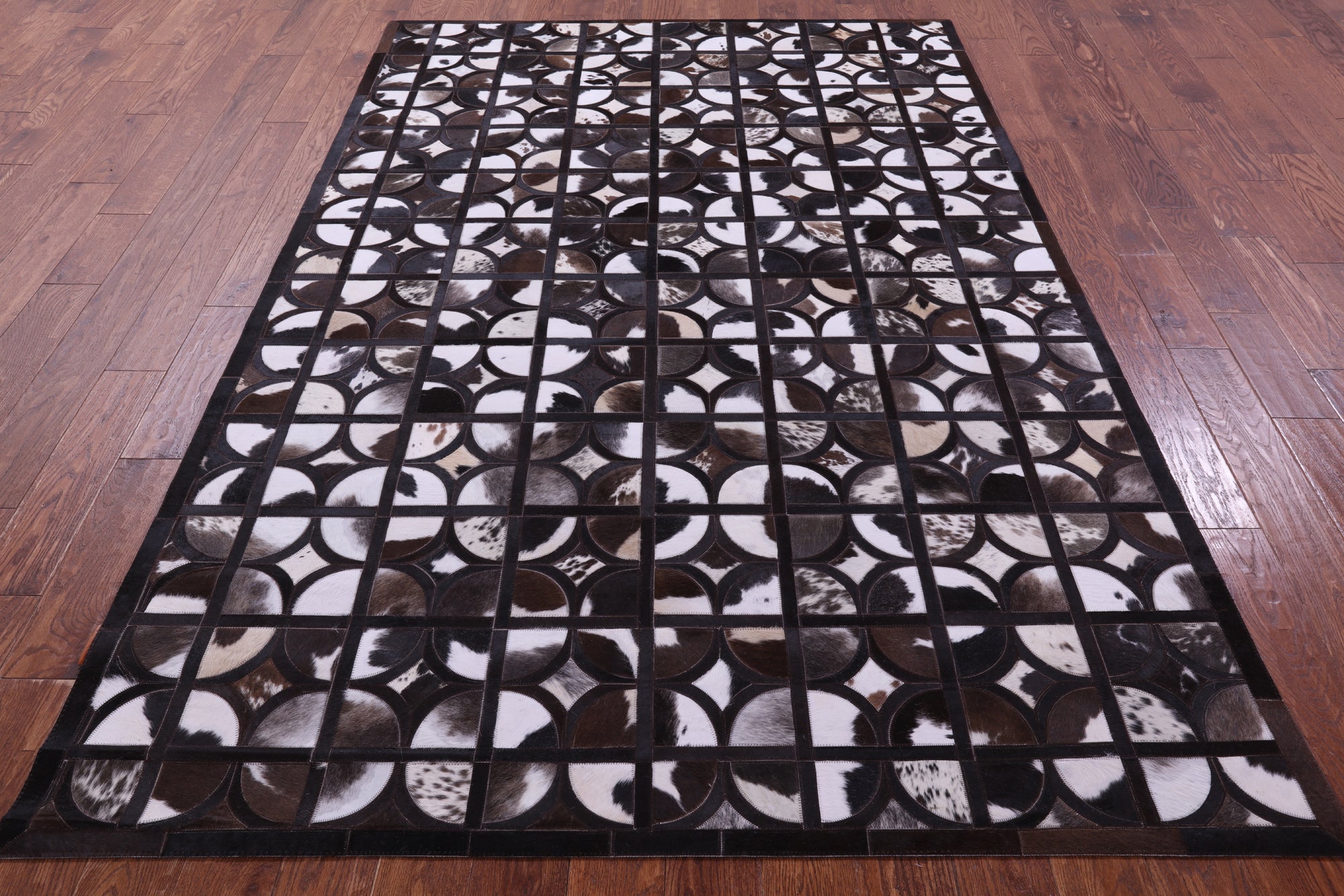 Brown & White Black Natural Cowhide Hand Stitched Patchwork Rug - 6' 0" X 9' 0"
