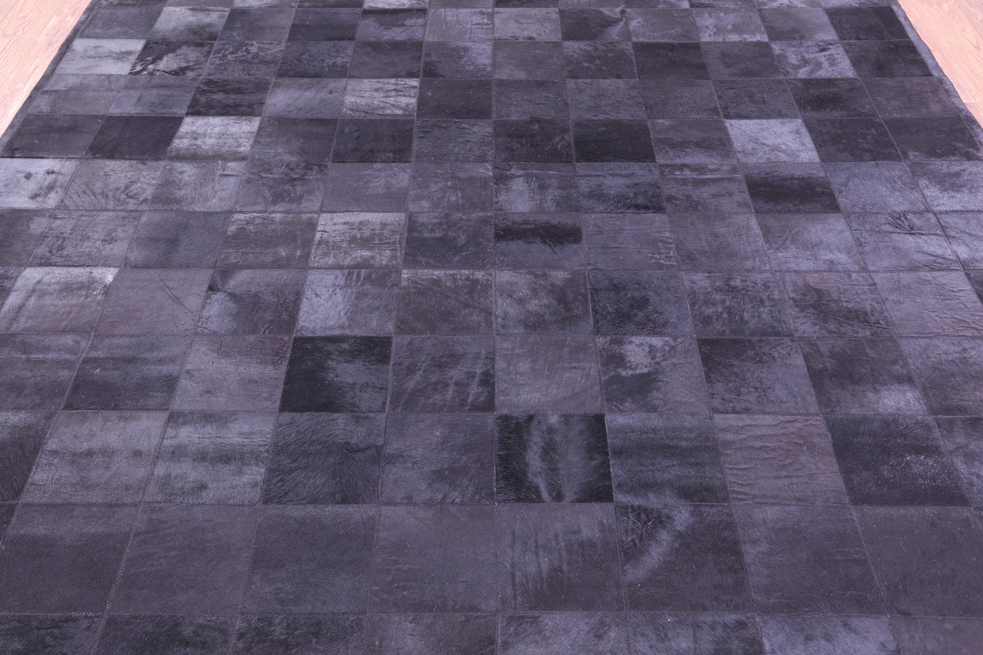 Black Natural Cowhide Hand Stitched Patchwork Rug - 8' 0" X 10' 0"
