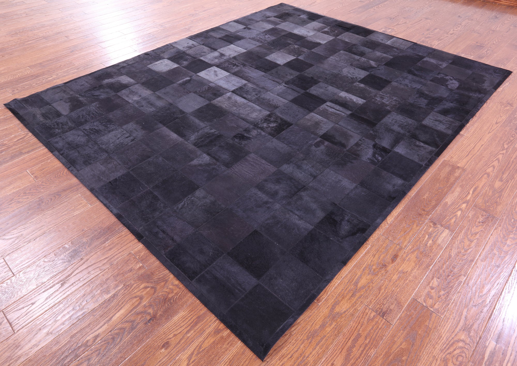 Black Natural Cowhide Hand Stitched Patchwork Rug - 8' 0" X 10' 0"