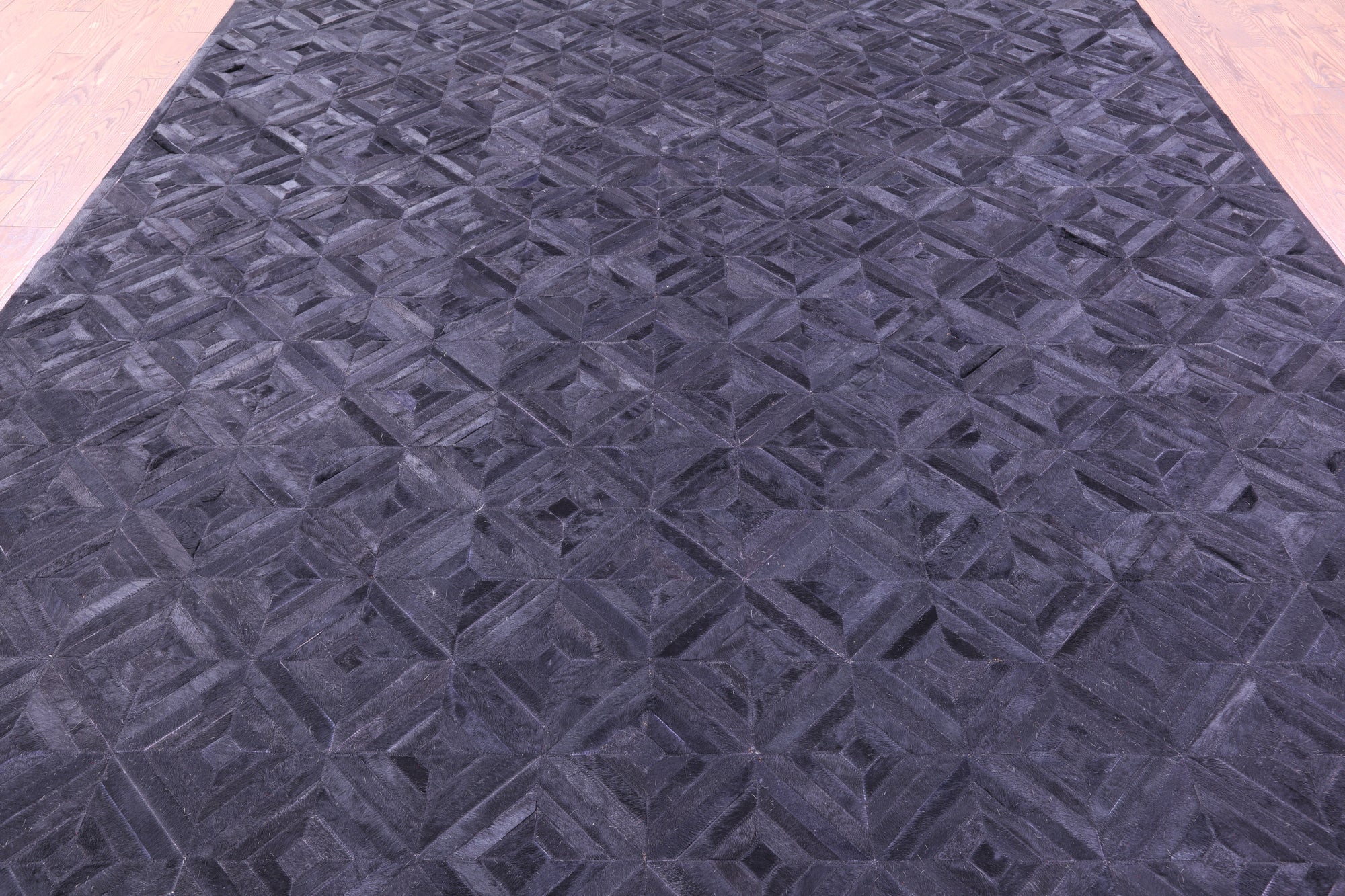 Black Natural Cowhide Hand Stitched Patchwork Rug - 9' 0" X 12' 0"