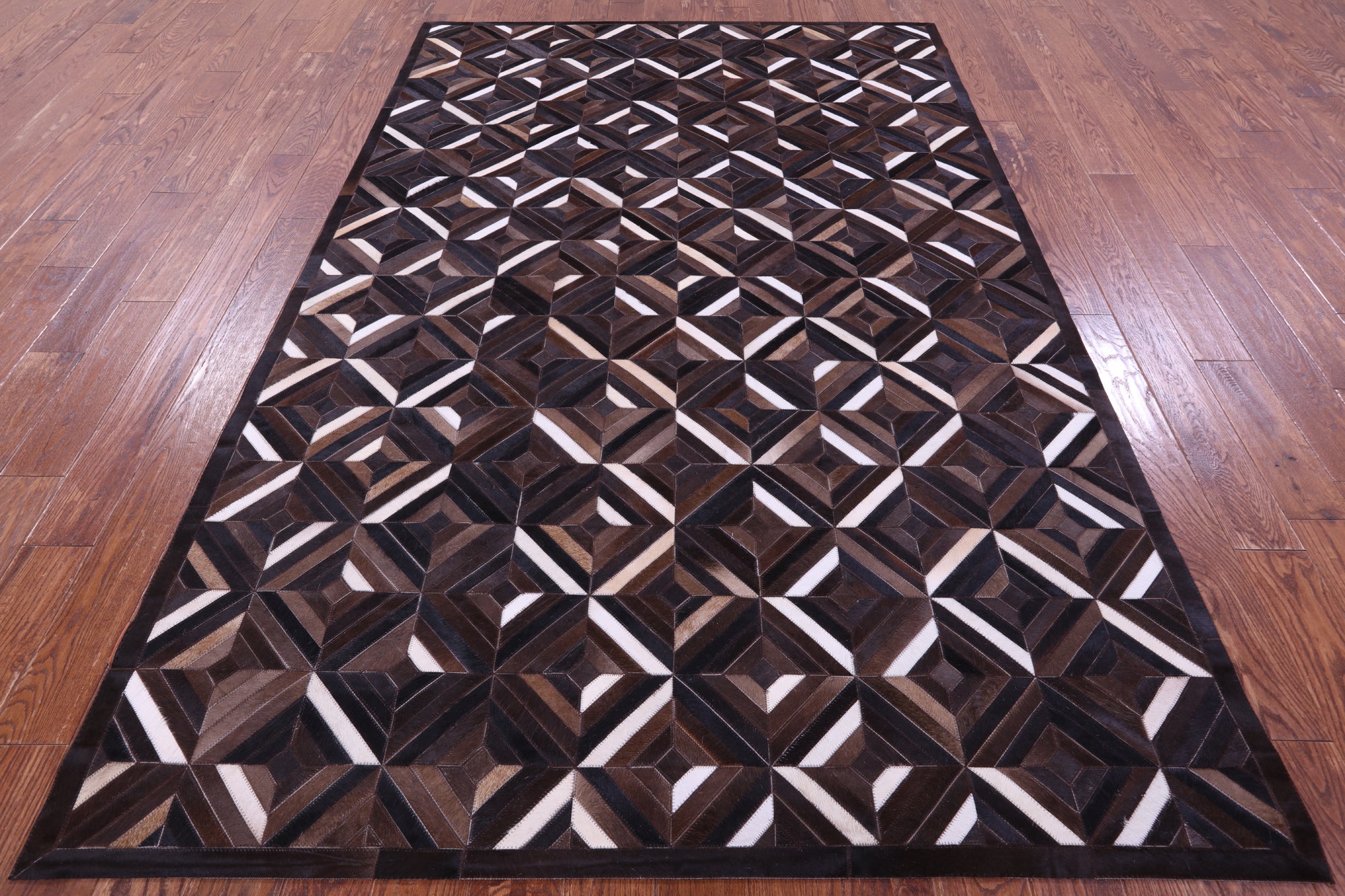 Brown Natural Cowhide Hand Stitched Patchwork Rug - 6' 0" X 9' 0"