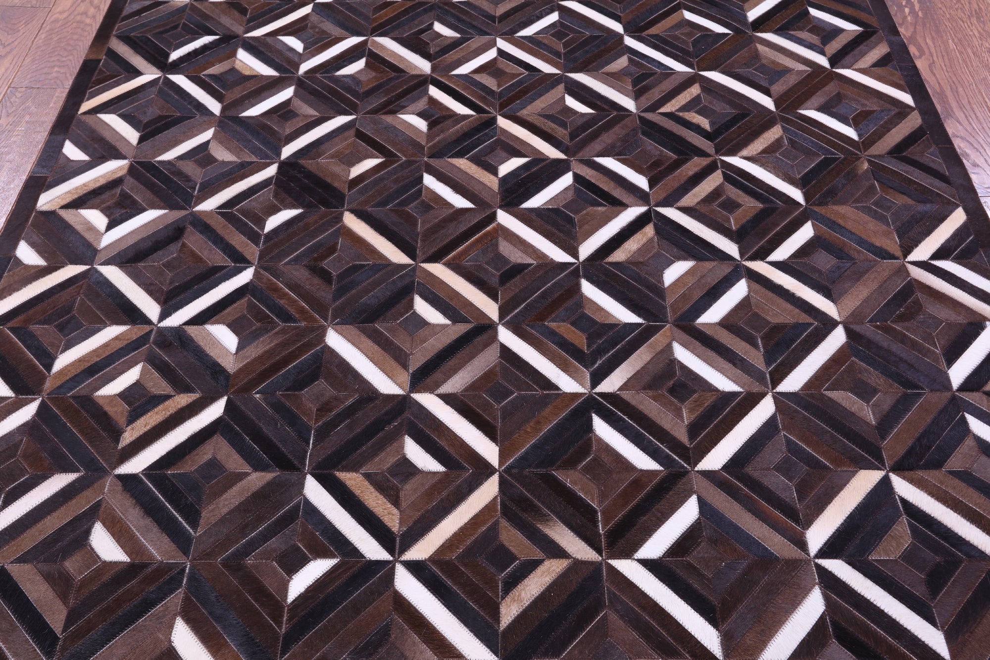 Brown Natural Cowhide Hand Stitched Patchwork Rug - 6' 0" X 9' 0"