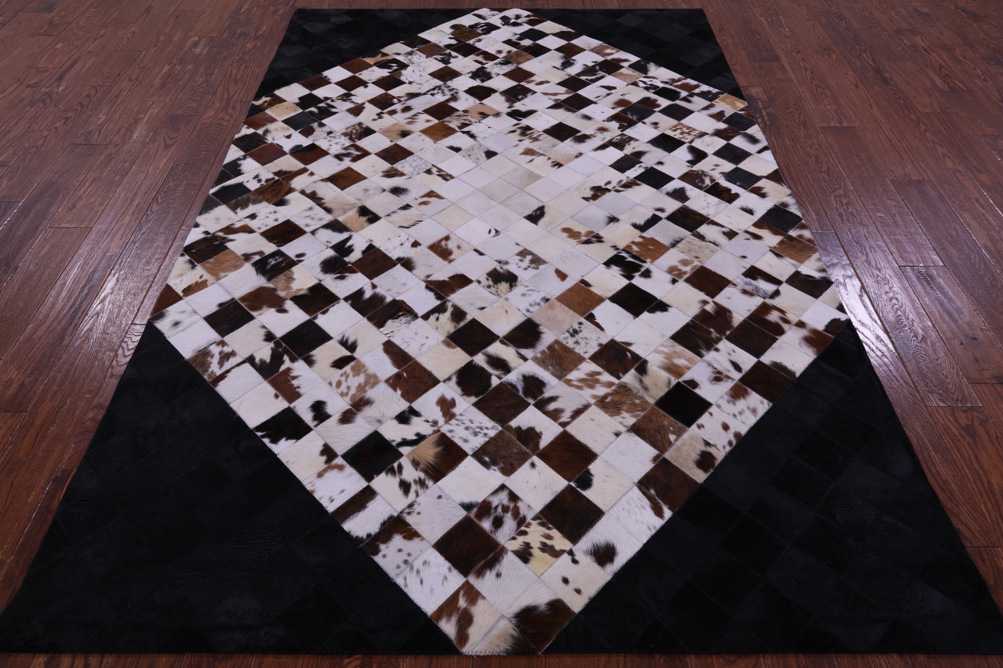Brown & White & Black Natural Cowhide Hand Stitched Patchwork Rug - 6' 0" X 9' 0"
