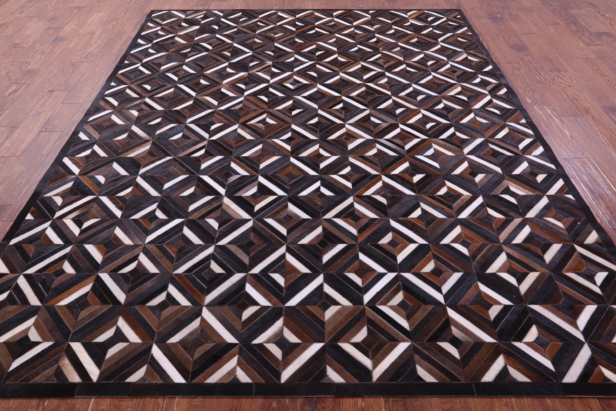 Brown Natural Cowhide Hand Stitched Patchwork Rug - 8' 0" X 10' 0"