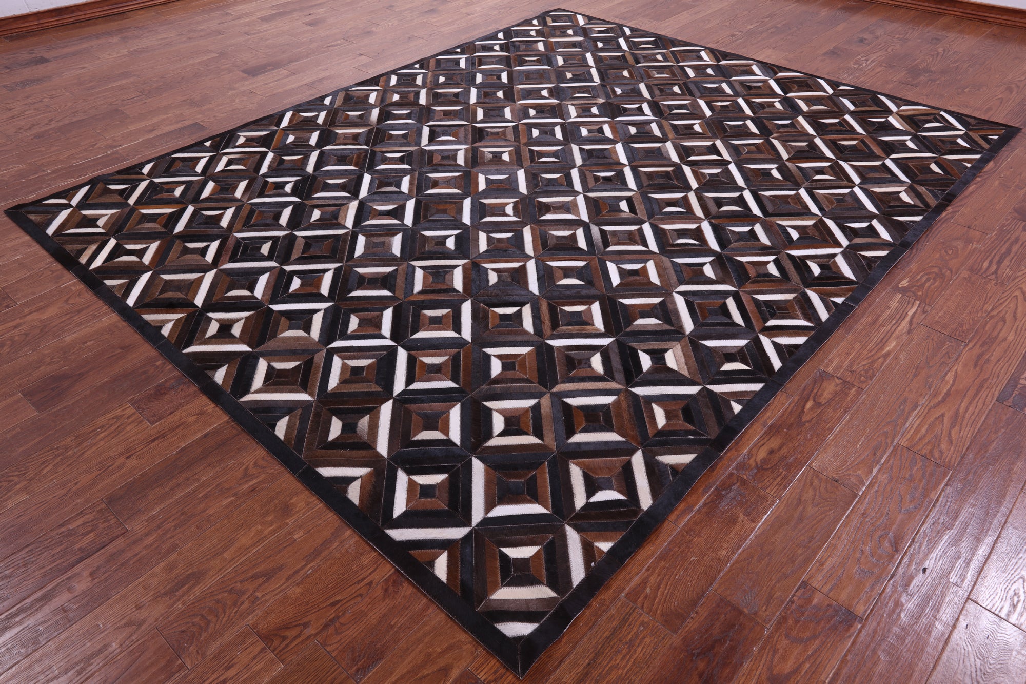 Brown Natural Cowhide Hand Stitched Patchwork Rug - 8' 0" X 10' 0"