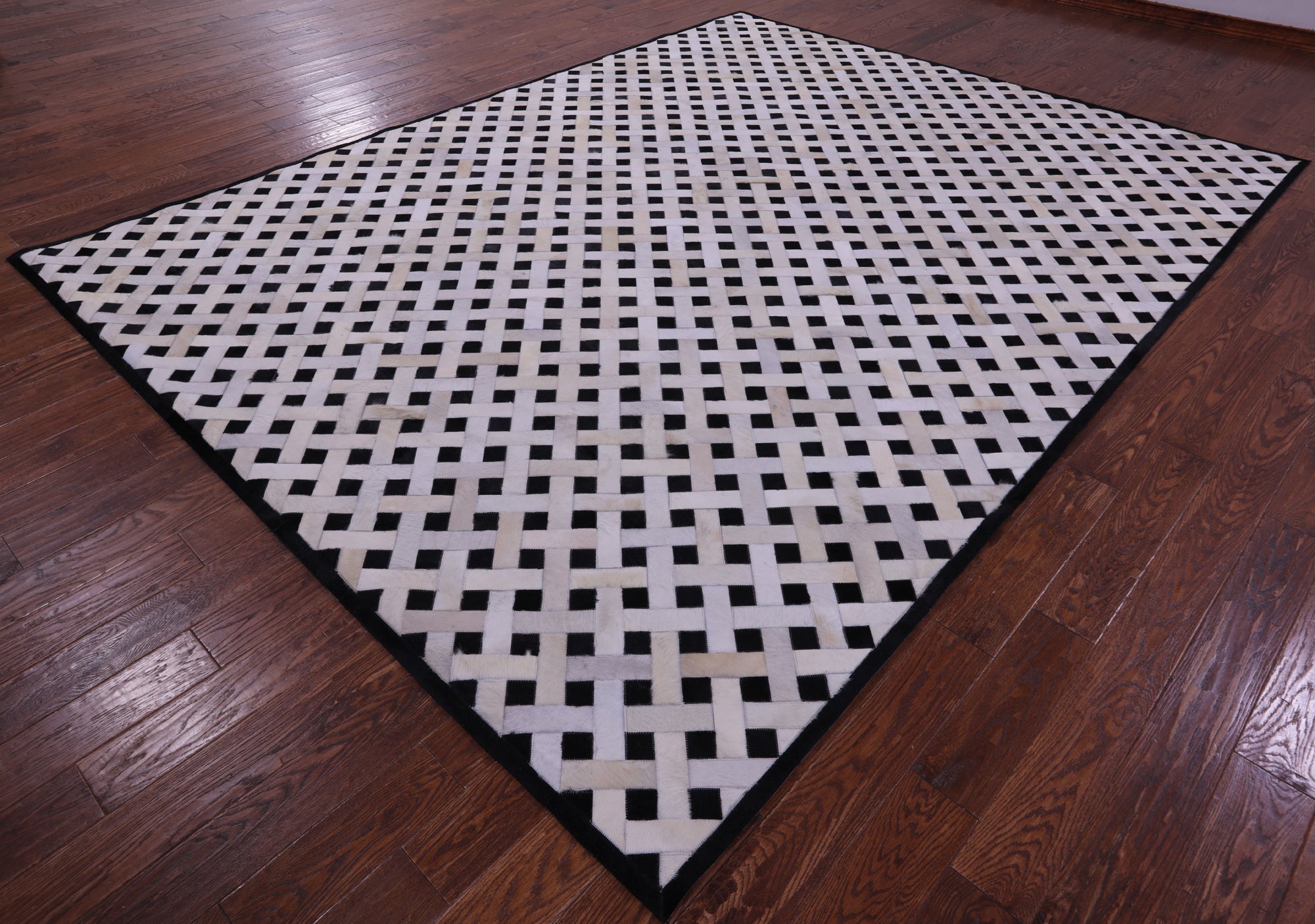Black & White Natural Cowhide Hand Stitched Patchwork Rug - 9' 0" X 12' 0"