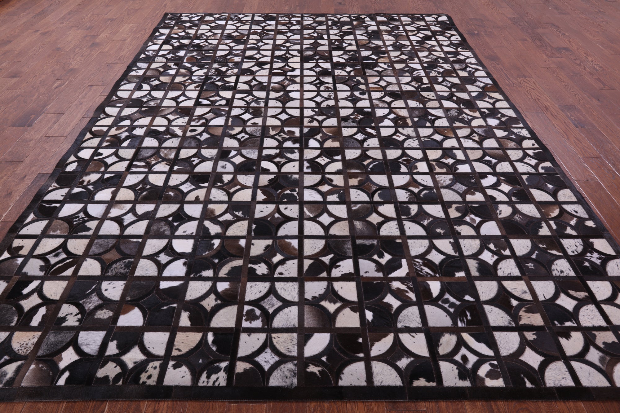 Brown & White Natural Cowhide Hand Stitched Patchwork Rug - 9' 0" X 12' 0"