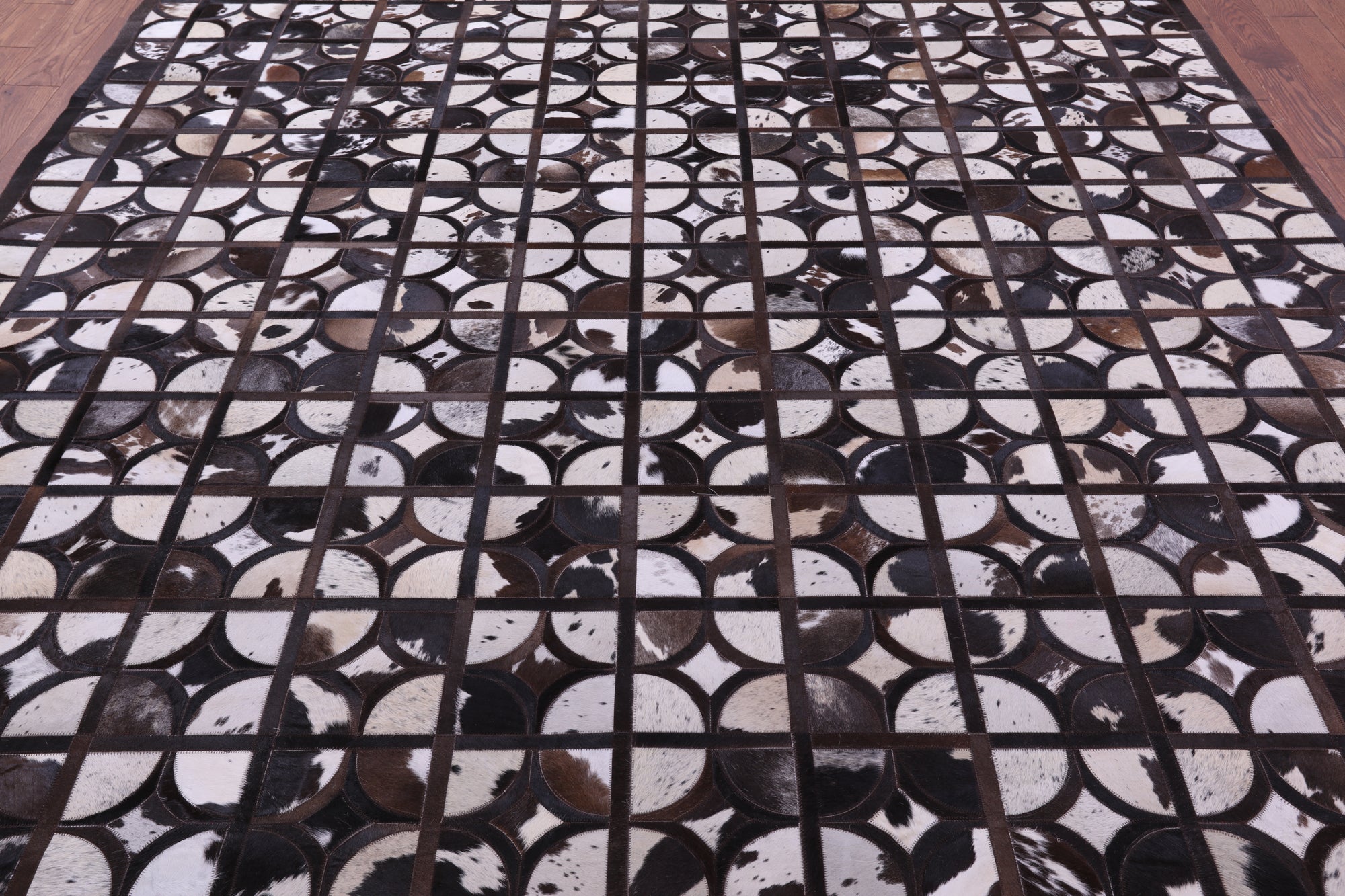 Brown & White Natural Cowhide Hand Stitched Patchwork Rug - 9' 0" X 12' 0"