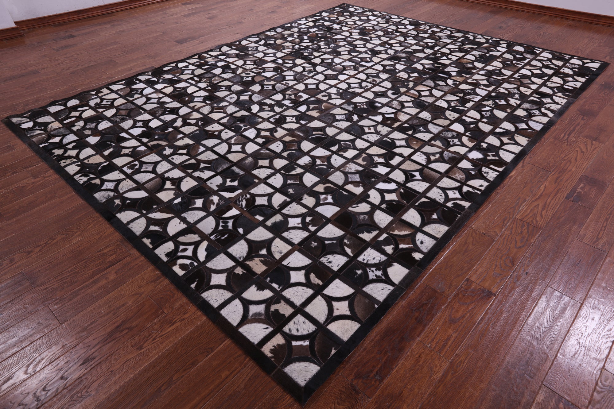 Brown & White Natural Cowhide Hand Stitched Patchwork Rug - 9' 0" X 12' 0"