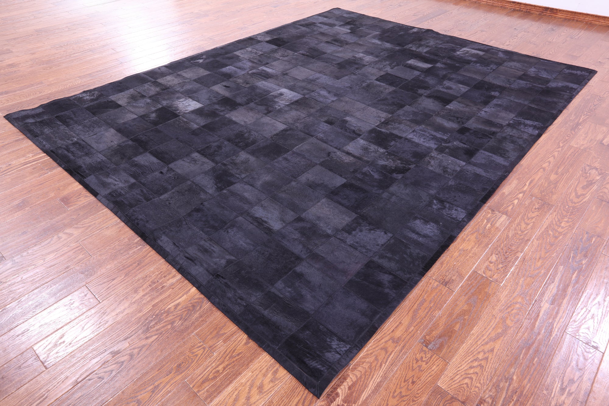 Black Natural Cowhide Hand Stitched Patchwork Rug - 9' 0" X 12' 0"