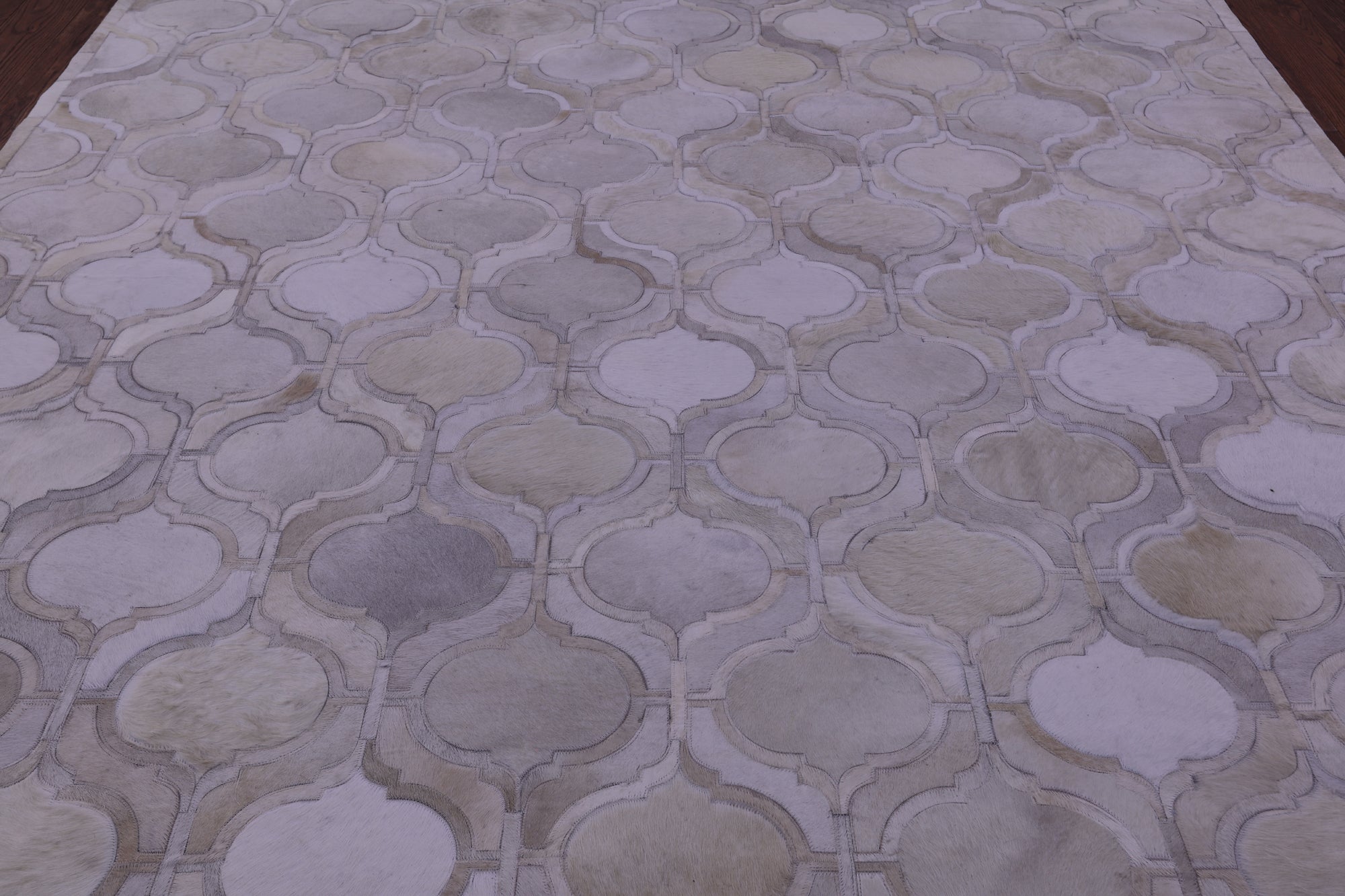 Ivory Natural Cowhide Hand Stitched Patchwork Rug - 8' 0" X 10' 0"