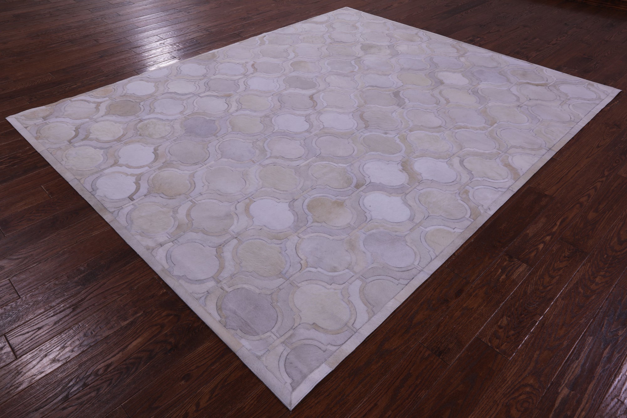 Ivory Natural Cowhide Hand Stitched Patchwork Rug - 8' 0" X 10' 0"