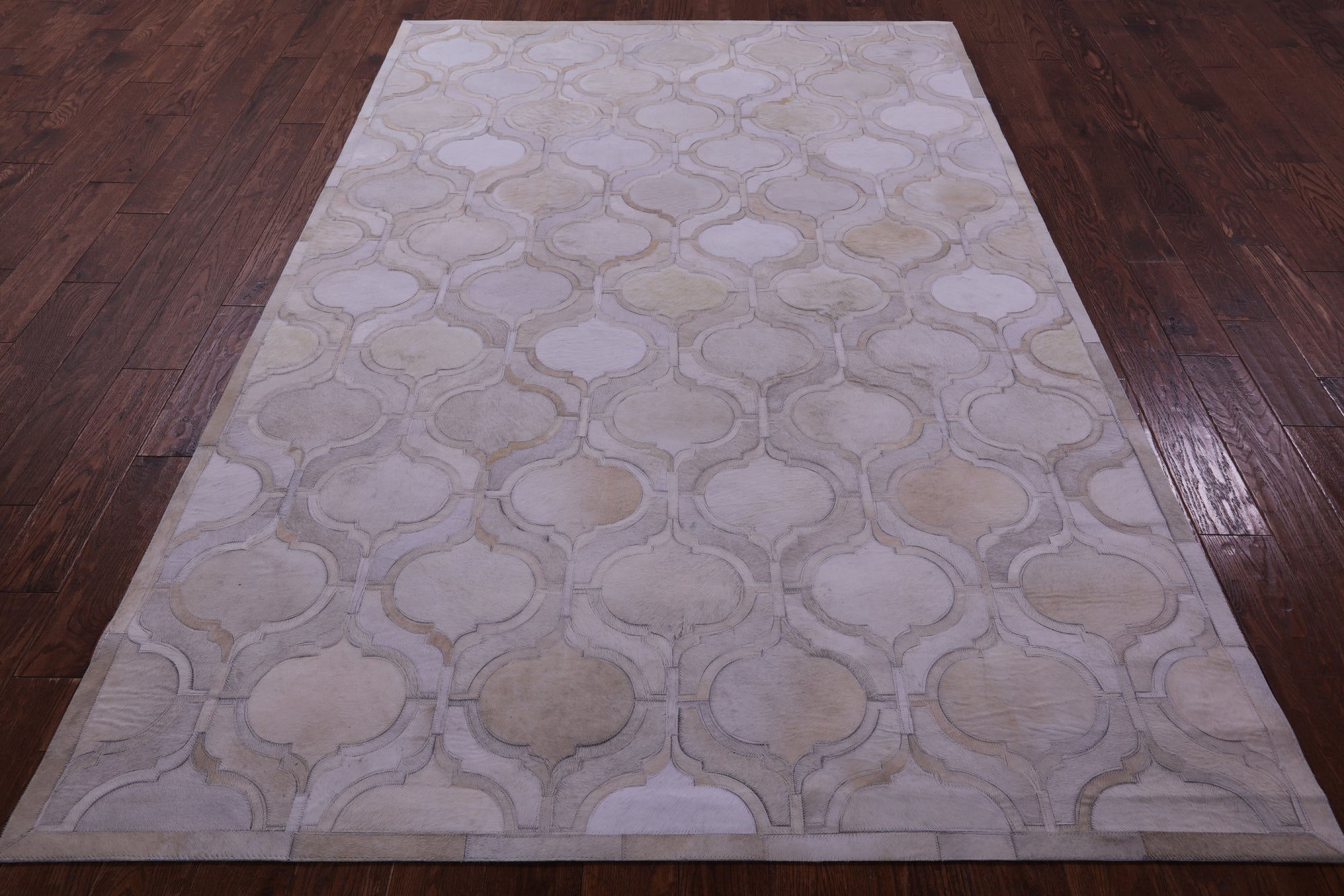 Ivory Natural Cowhide Hand Stitched Patchwork Rug - 6' 0" X 9' 0"