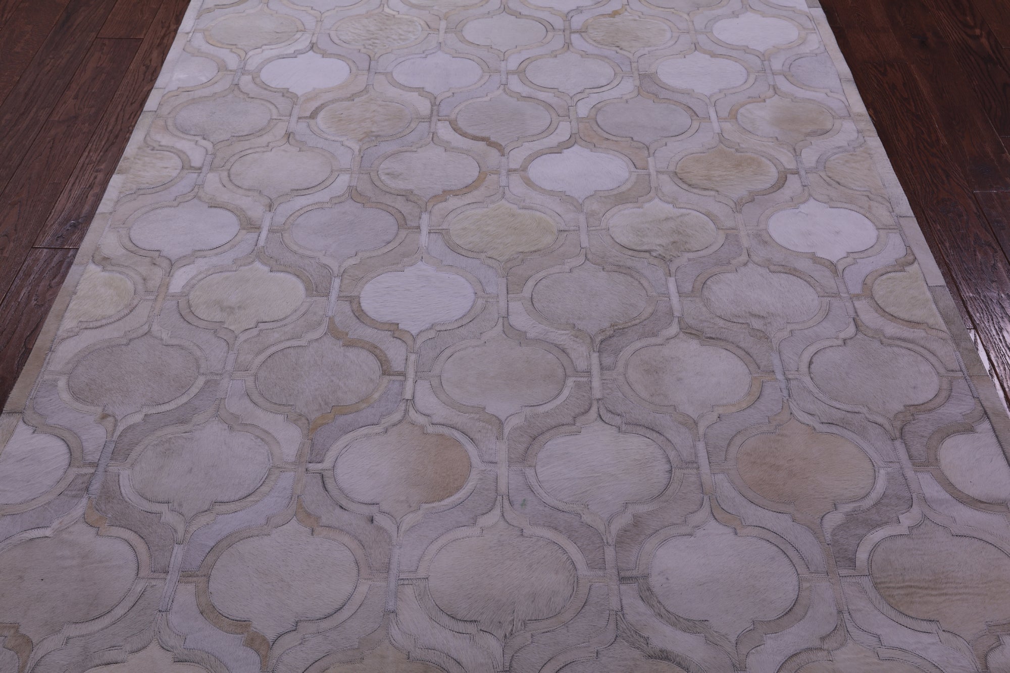 Ivory Natural Cowhide Hand Stitched Patchwork Rug - 6' 0" X 9' 0"