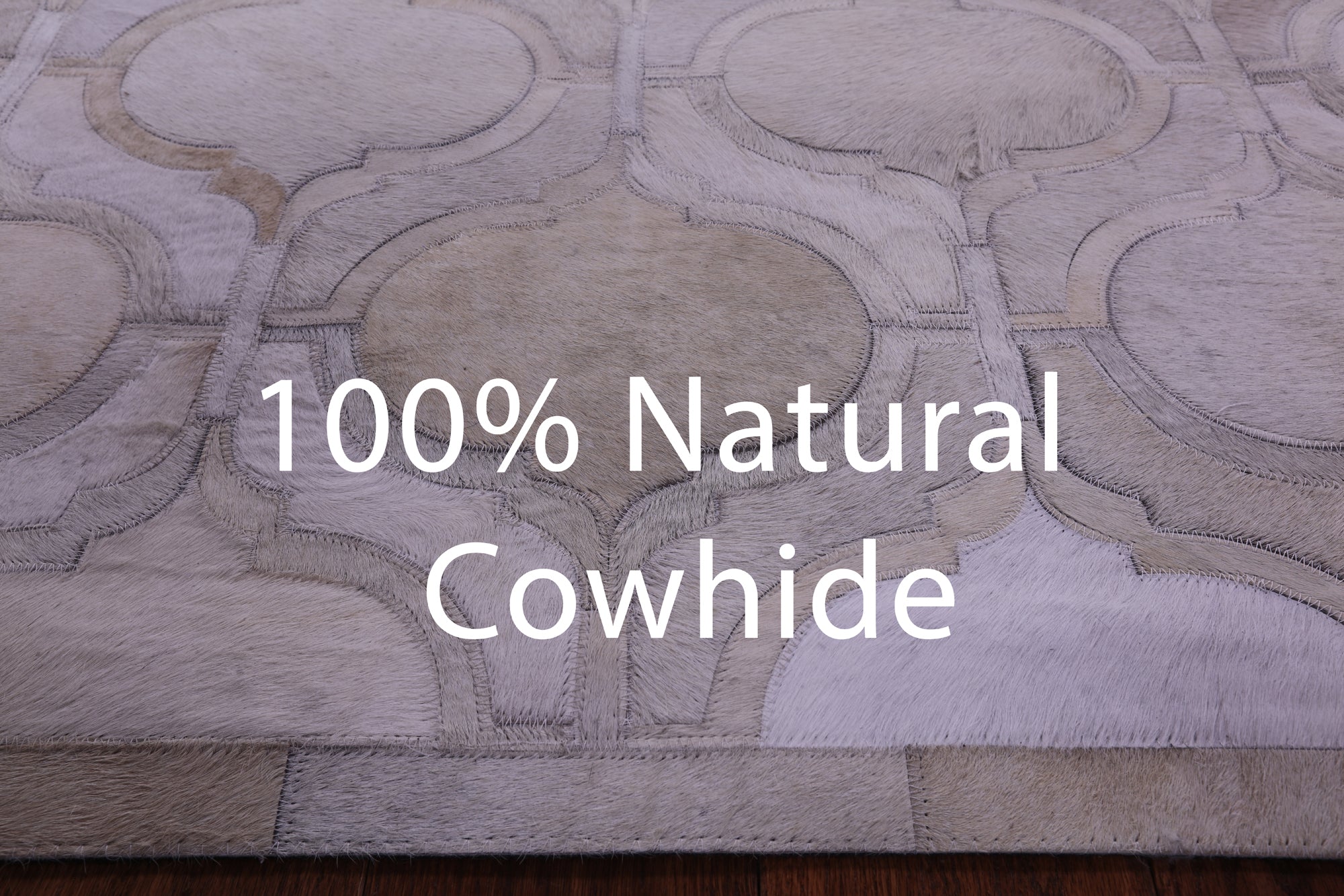 Ivory Natural Cowhide Hand Stitched Patchwork Rug - 6' 0" X 9' 0"