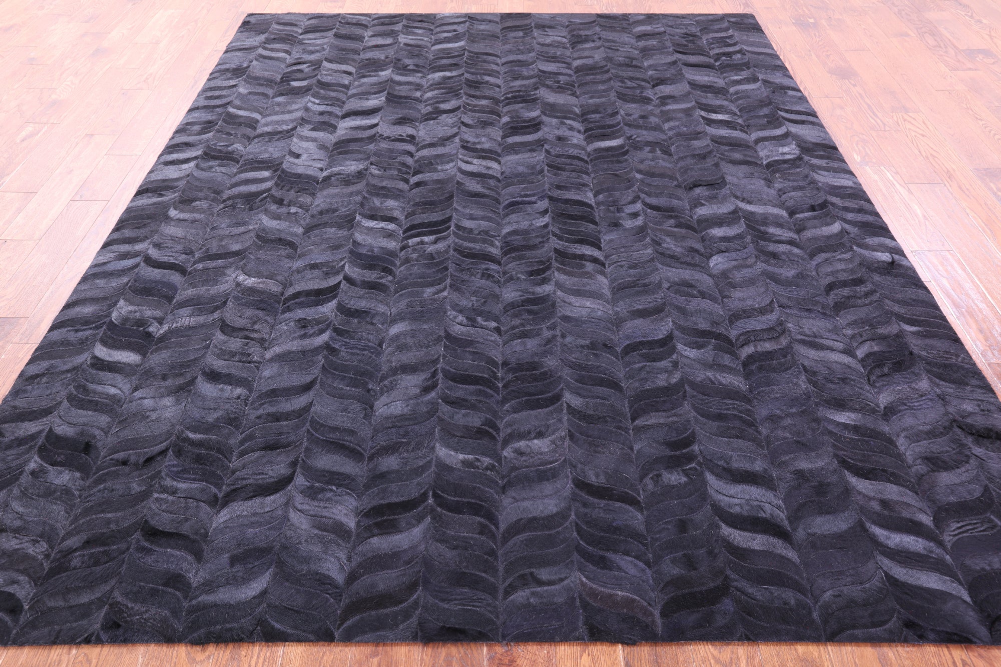Black Natural Cowhide Hand Stitched Patchwork Rug - 8' 0" X 10' 0"