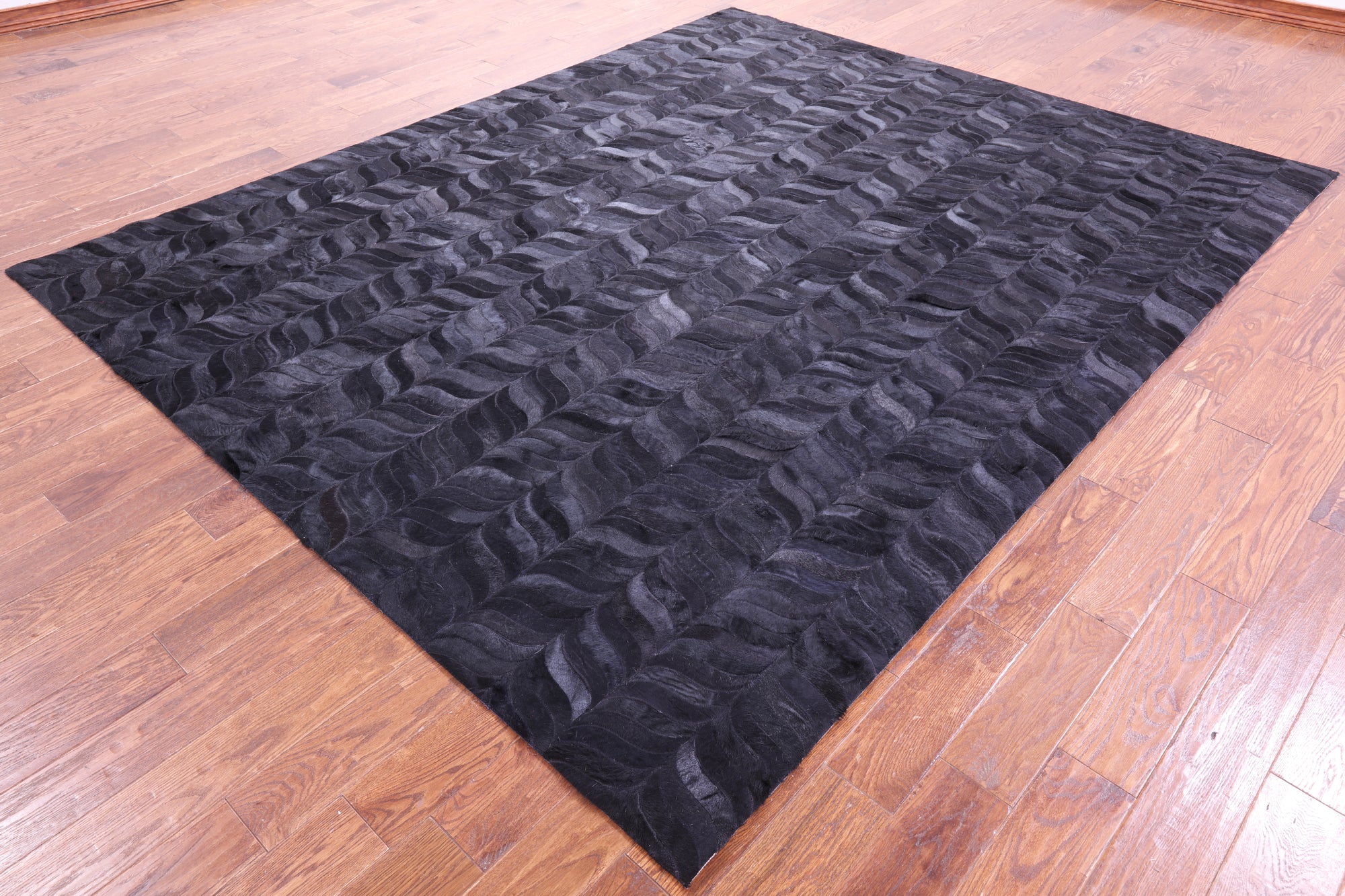 Black Natural Cowhide Hand Stitched Patchwork Rug - 8' 0" X 10' 0"
