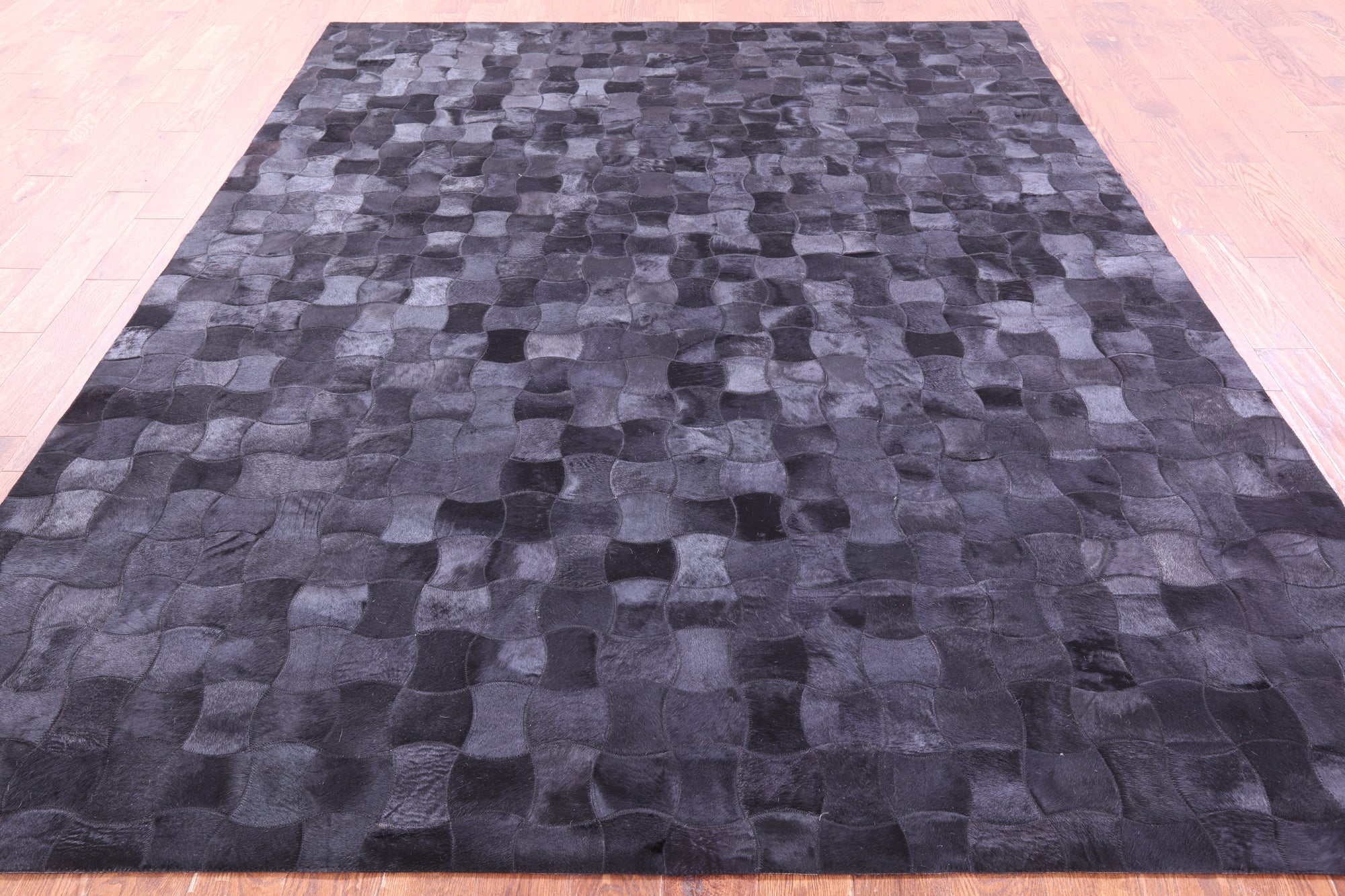 Black Natural Cowhide Hand Stitched Patchwork Rug - 8' 0" X 10' 0"