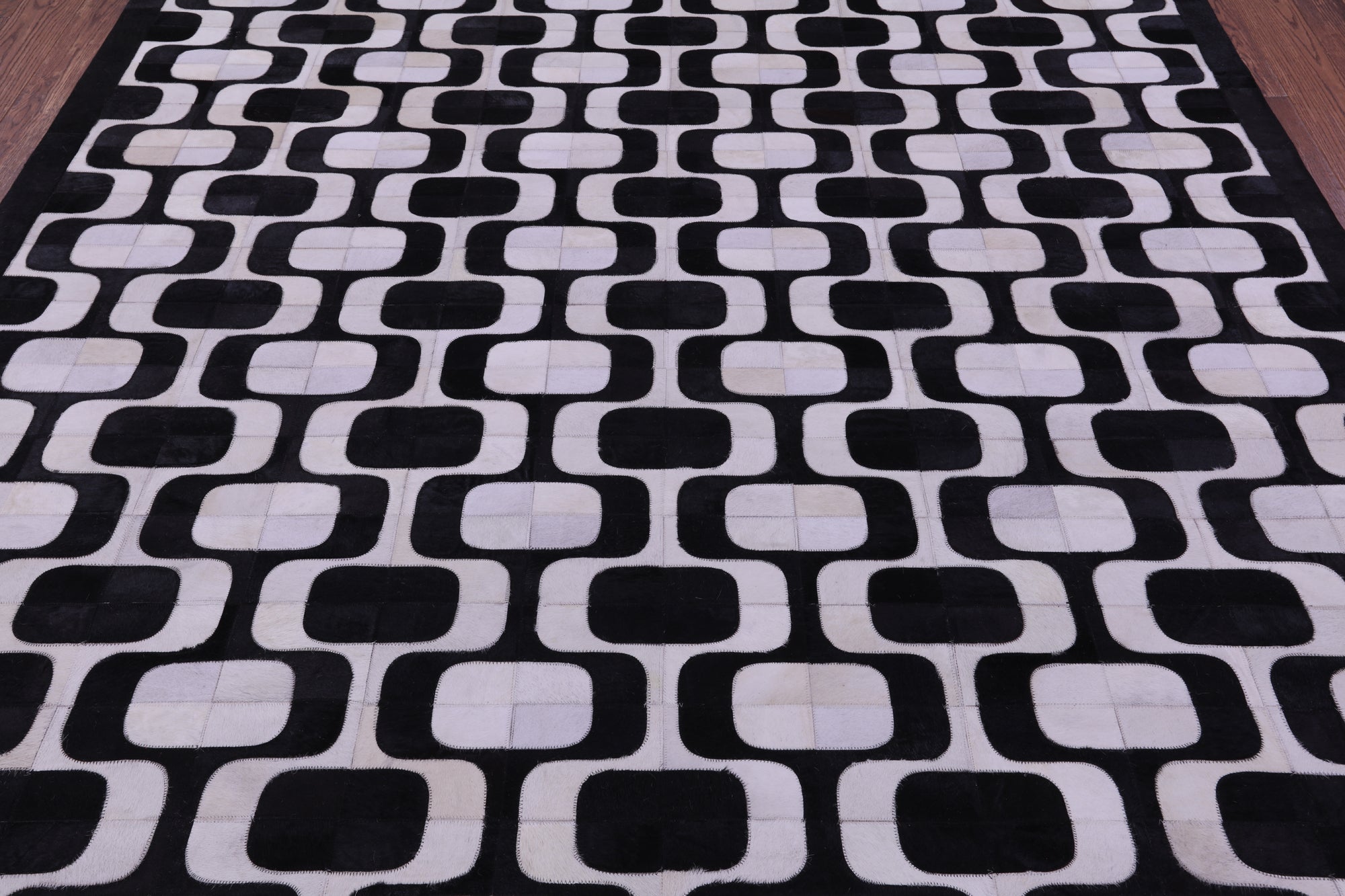 Black & White Natural Cowhide Hand Stitched Patchwork Rug - 8' 0" X 10' 0"