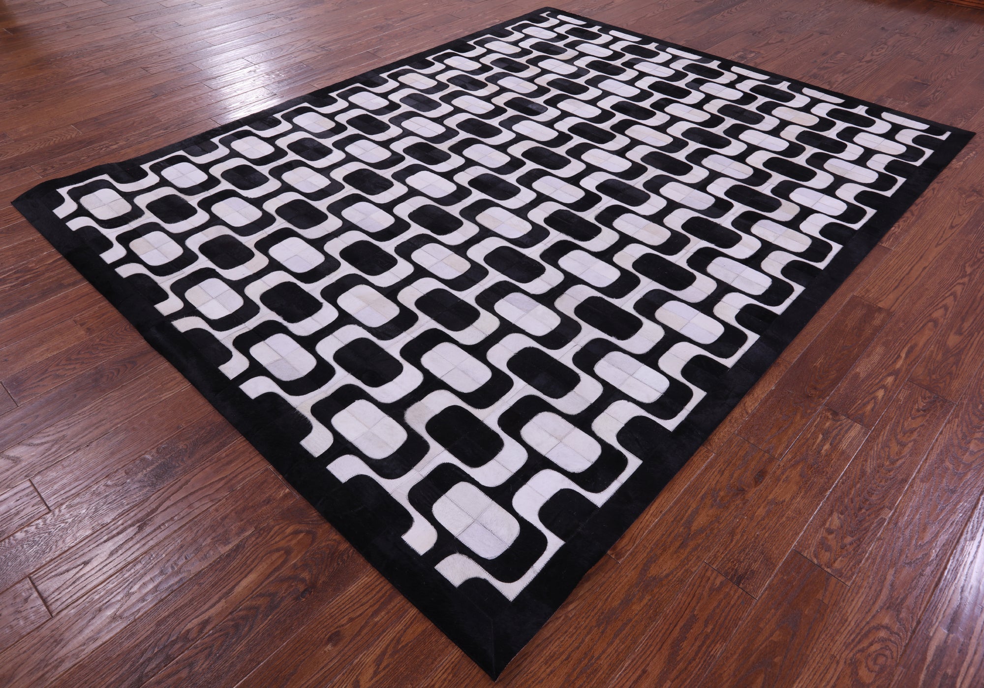 Black & White Natural Cowhide Hand Stitched Patchwork Rug - 8' 0" X 10' 0"
