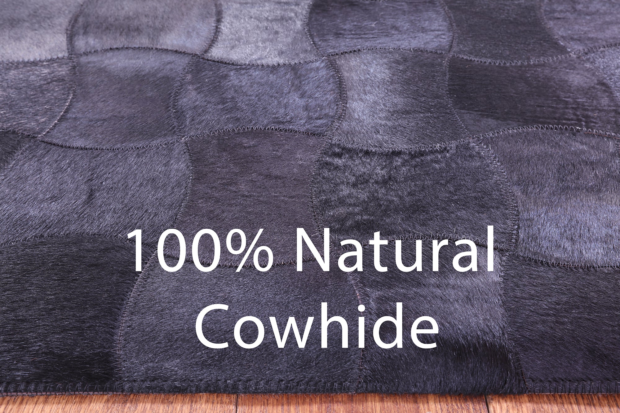 Black Natural Cowhide Hand Stitched Patchwork Rug - 6' 0" X 9' 0"