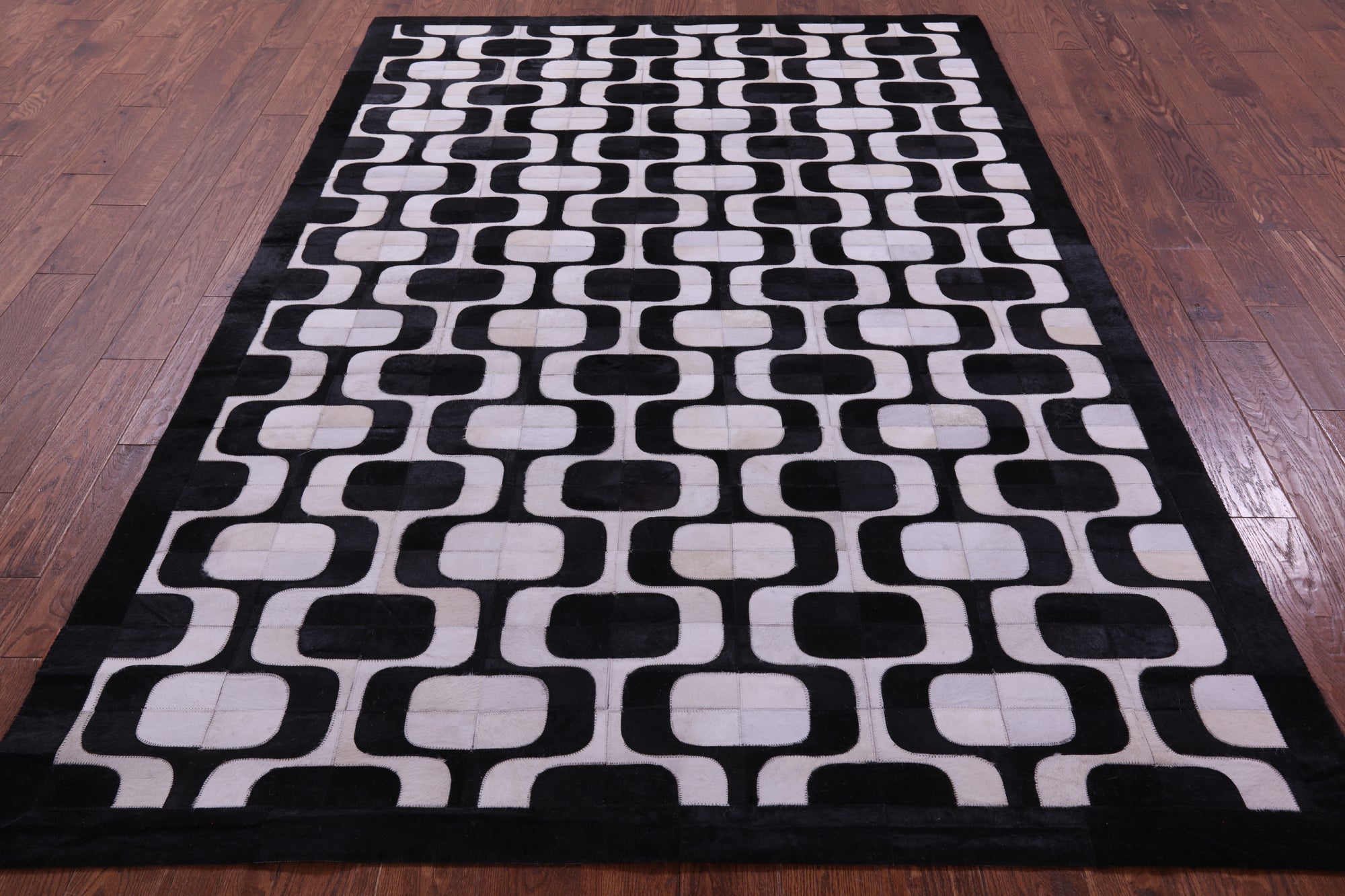 Black & White Natural Cowhide Hand Stitched Patchwork Rug - 6' 0" X 9' 0"