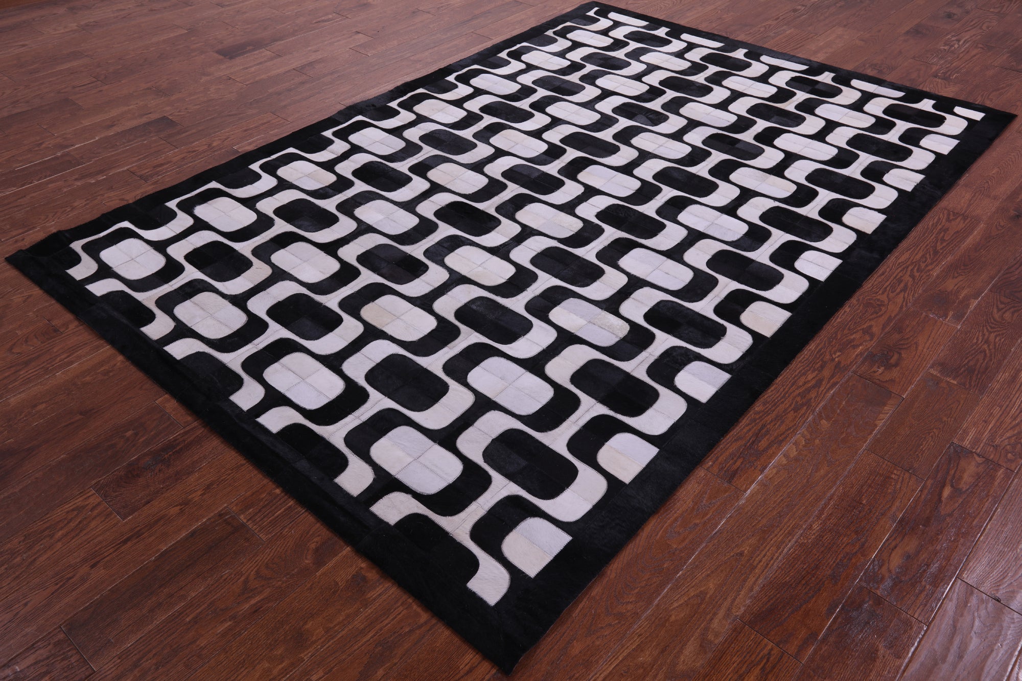 Black & White Natural Cowhide Hand Stitched Patchwork Rug - 6' 0" X 9' 0"