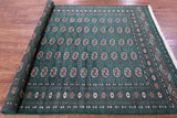 Green Signed Bokhara Handmade Wool Rug - 6' 3" X 9' 0" - Golden Nile