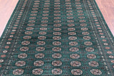 Green Signed Bokhara Handmade Wool Rug - 6' 3" X 9' 0" - Golden Nile