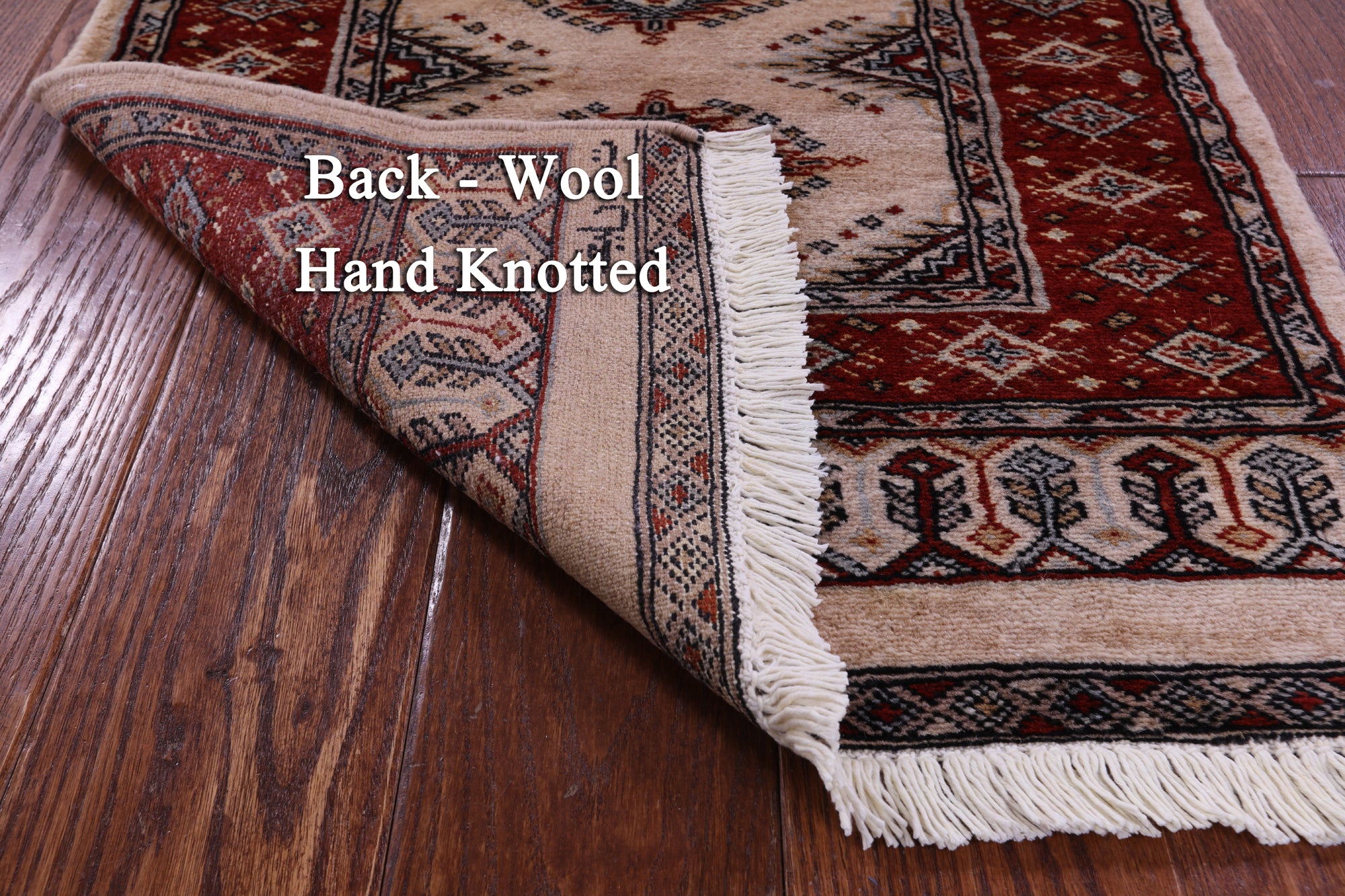 Ivory Signed Bokhara Hand-Knotted Wool Rug - 2' 0" X 4' 3"