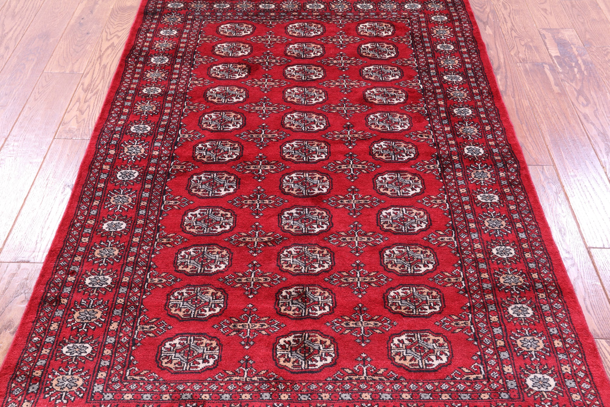 Red Bokhara Handmade Wool Rug - 4' 2" X 6' 0"