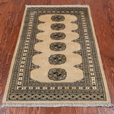 Ivory Bokhara Hand Knotted Wool Rug - 2' 7" X 4' 2"