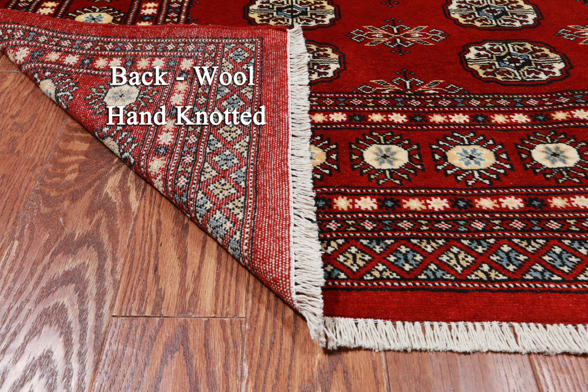 Red Bokhara Handmade Wool Rug - 4' 1" X 5' 7"