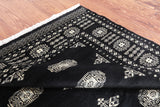 Black Bokhara Handmade Wool Rug - 4' 7" X 6' 11"