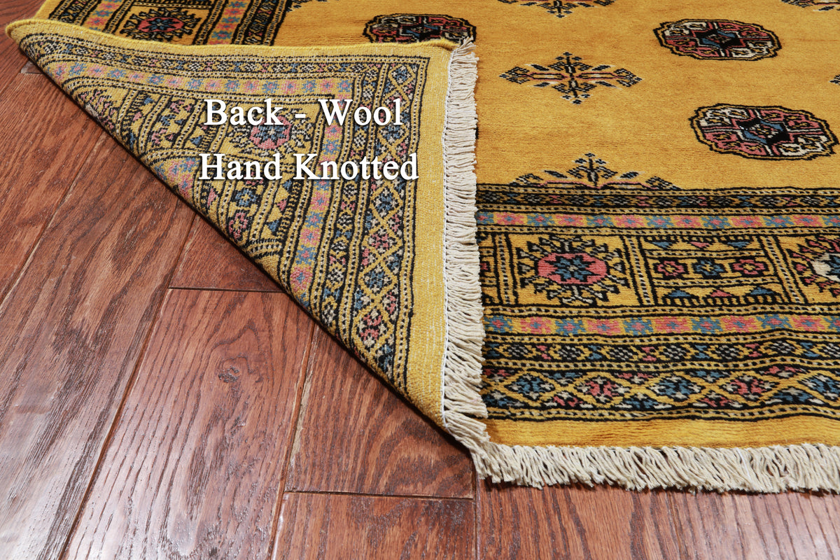 Gold Bokhara Handmade Wool Rug - 5' 5" X 7' 9"