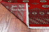 Red Bokhara Handmade Wool Rug - 5' 6" X 7' 10"
