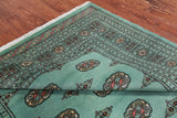 Green Bokhara Hand-Knotted Wool Rug - 5' 8" X 8' 1"