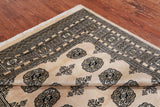 Ivory Bokhara Handmade Wool Rug - 5' 6" X 7' 10"