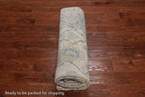 Ivory Peshawar Washed Out Handmade Wool Rug - 6' 1" X 9' 0"