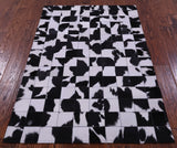 Black & White Natural Cowhide Hand Stitched Patchwork Rug - 3' 3" X 4' 10" - Golden Nile