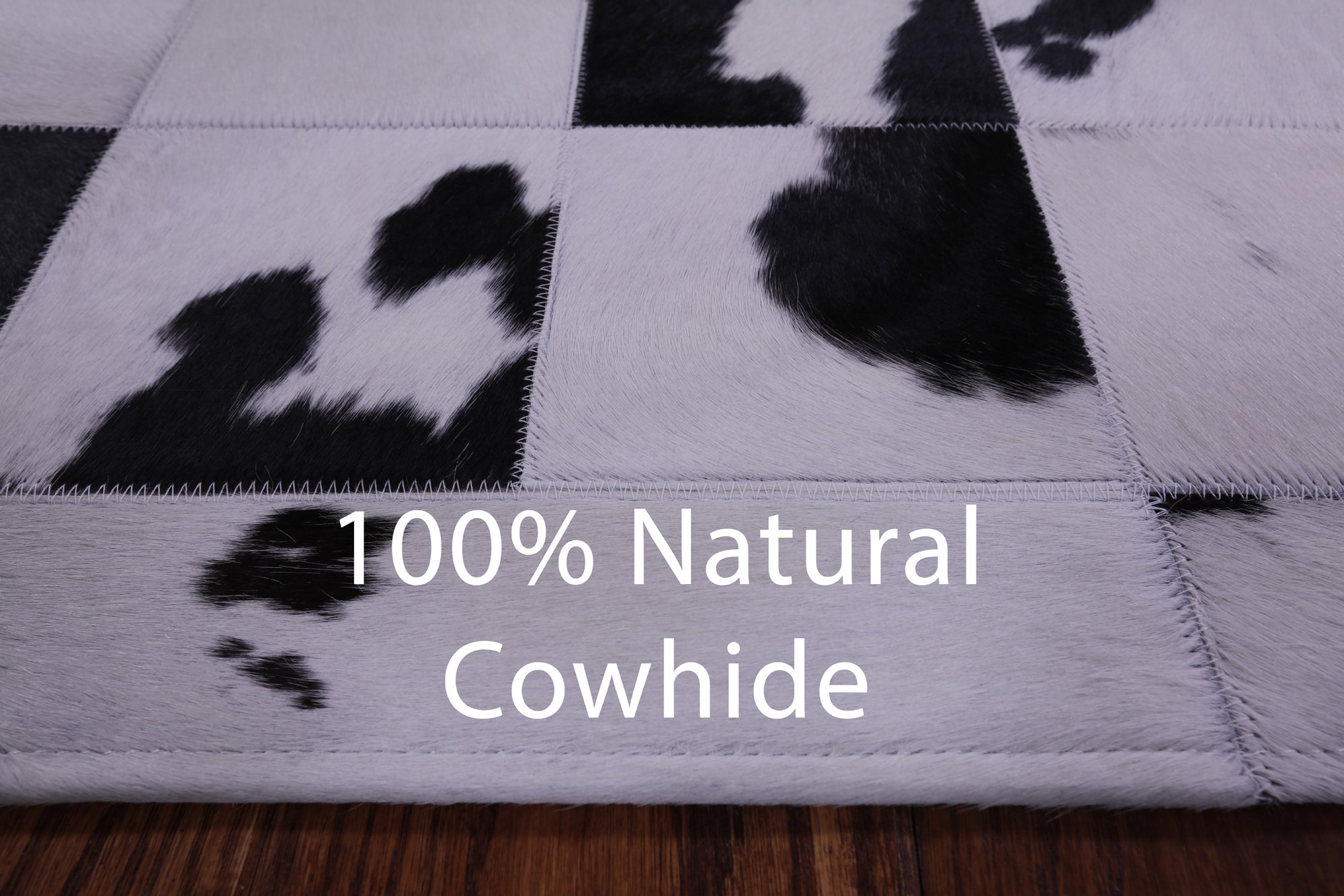 Black & White Natural Cowhide Hand Stitched Patchwork Rug - 3' 5" X 5' 0" - Golden Nile